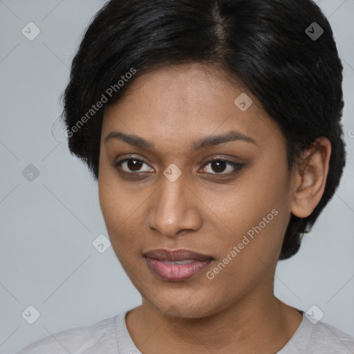 Joyful white adult female with short  brown hair and brown eyes