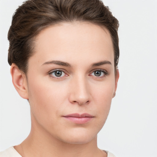 Neutral white young-adult female with short  brown hair and brown eyes