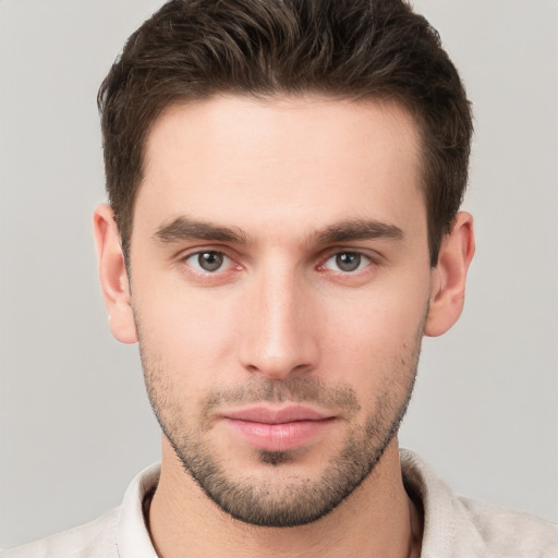 Neutral white young-adult male with short  brown hair and brown eyes