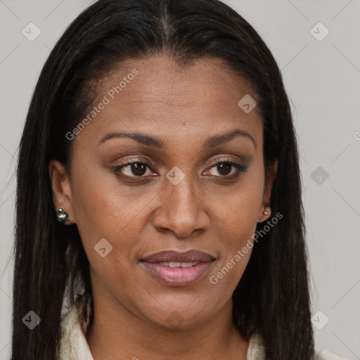 Joyful black young-adult female with long  brown hair and brown eyes