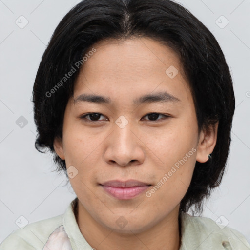 Joyful asian young-adult female with medium  brown hair and brown eyes