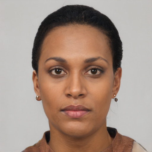 Neutral latino young-adult female with short  black hair and brown eyes
