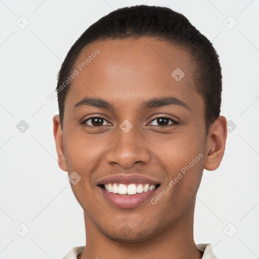 Joyful black young-adult male with short  brown hair and brown eyes