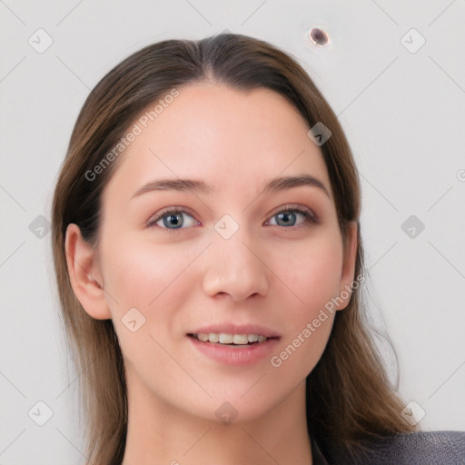 Joyful white young-adult female with long  brown hair and blue eyes