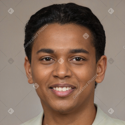 Joyful black young-adult male with short  black hair and brown eyes