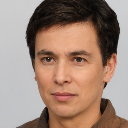 Neutral white adult male with short  brown hair and brown eyes