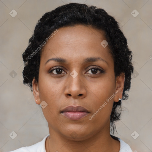 Neutral black young-adult female with short  black hair and brown eyes