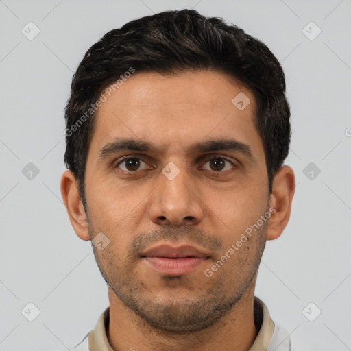 Neutral white young-adult male with short  black hair and brown eyes