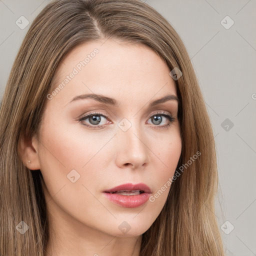 Neutral white young-adult female with long  brown hair and brown eyes