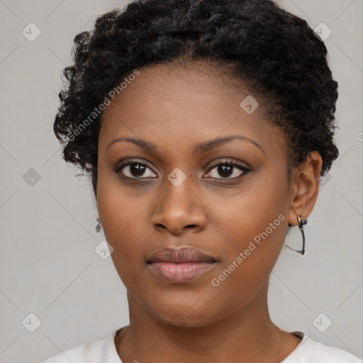 Neutral black young-adult female with short  brown hair and brown eyes