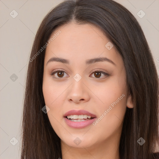 Joyful asian young-adult female with long  brown hair and brown eyes