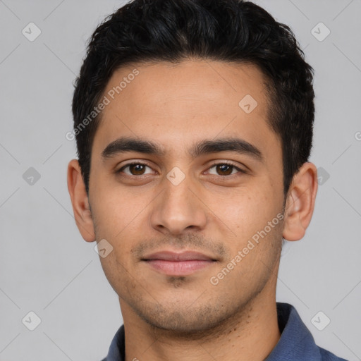Neutral white young-adult male with short  black hair and brown eyes
