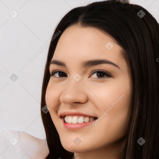 Joyful white young-adult female with long  black hair and brown eyes