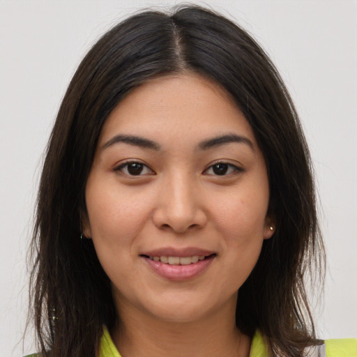 Joyful white young-adult female with medium  brown hair and brown eyes