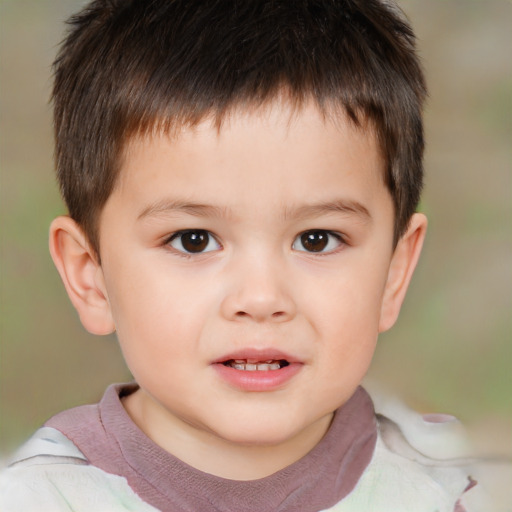 Joyful white child male with short  brown hair and brown eyes