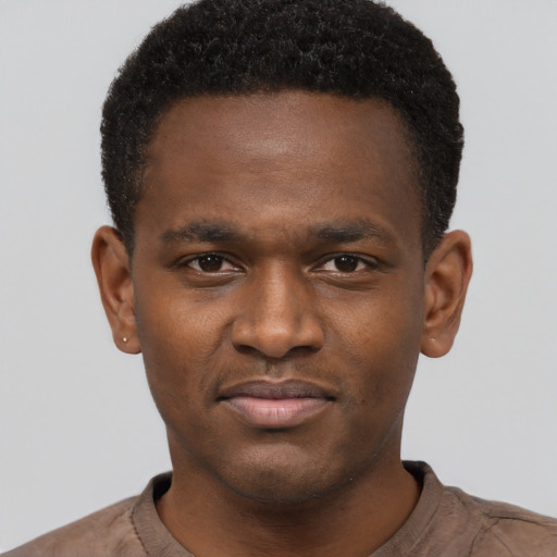 Neutral black young-adult male with short  brown hair and brown eyes