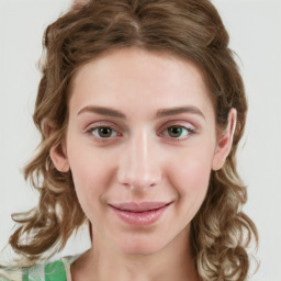 Joyful white young-adult female with medium  brown hair and green eyes