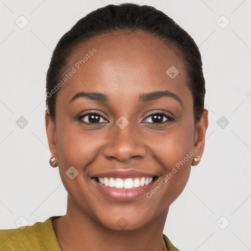 Joyful black young-adult female with short  brown hair and brown eyes