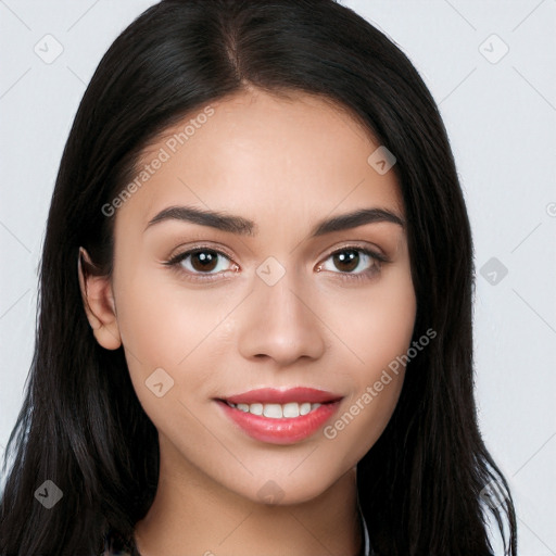 Joyful white young-adult female with long  black hair and brown eyes