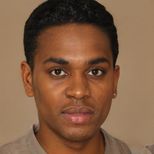 Neutral black young-adult male with short  black hair and brown eyes