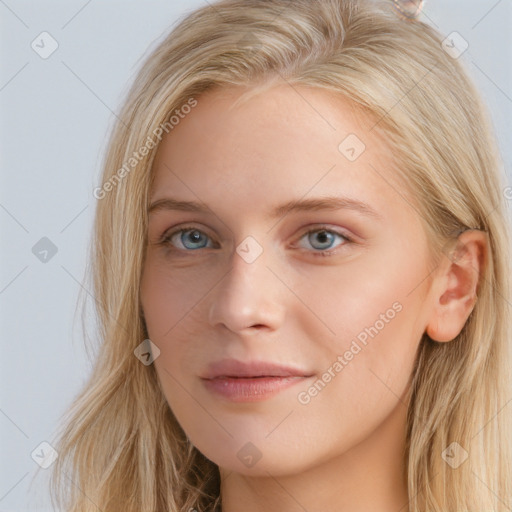 Joyful white young-adult female with long  brown hair and blue eyes