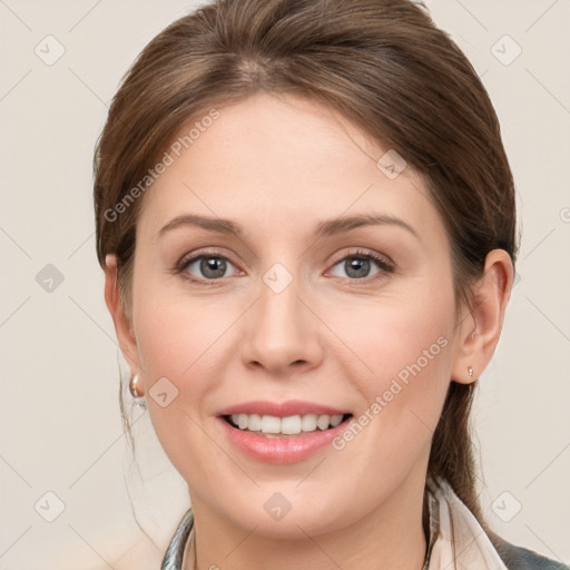 Joyful white young-adult female with medium  brown hair and grey eyes