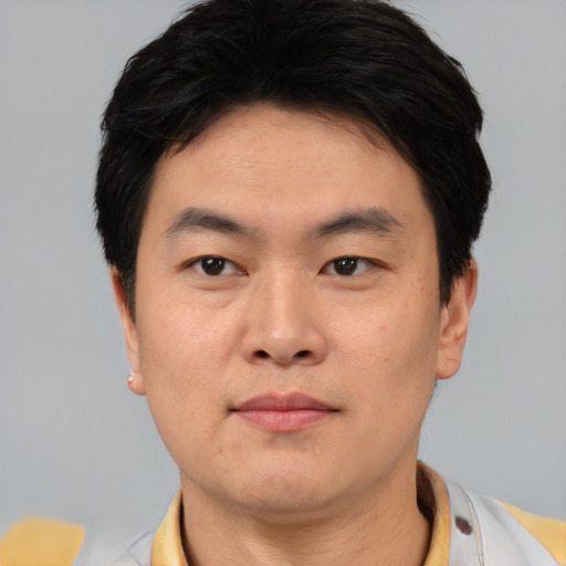 Neutral asian young-adult male with short  black hair and brown eyes
