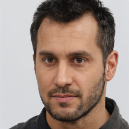 Neutral white adult male with short  brown hair and brown eyes