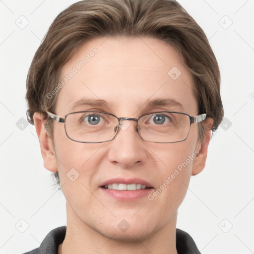 Joyful white adult female with short  brown hair and grey eyes