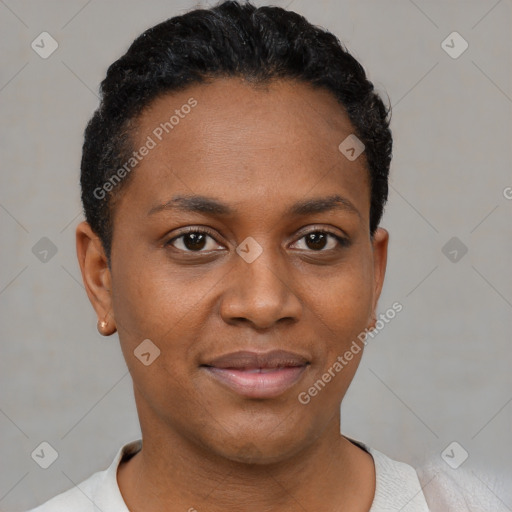 Joyful black young-adult female with short  black hair and brown eyes