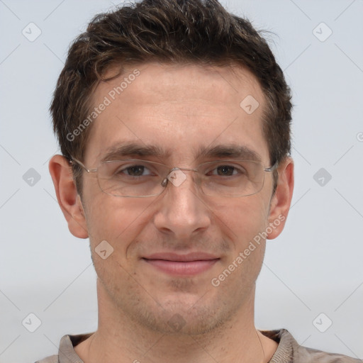 Joyful white adult male with short  brown hair and brown eyes