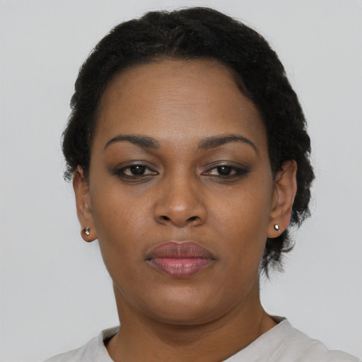 Neutral black young-adult female with short  brown hair and brown eyes