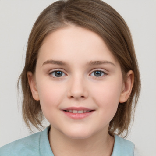 Joyful white child female with medium  brown hair and grey eyes