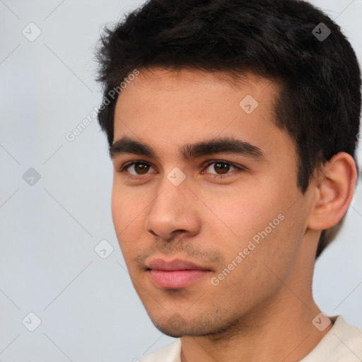 Neutral white young-adult male with short  black hair and brown eyes