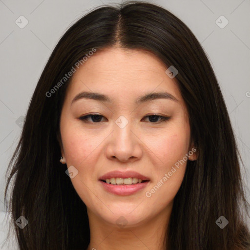 Joyful asian young-adult female with long  brown hair and brown eyes