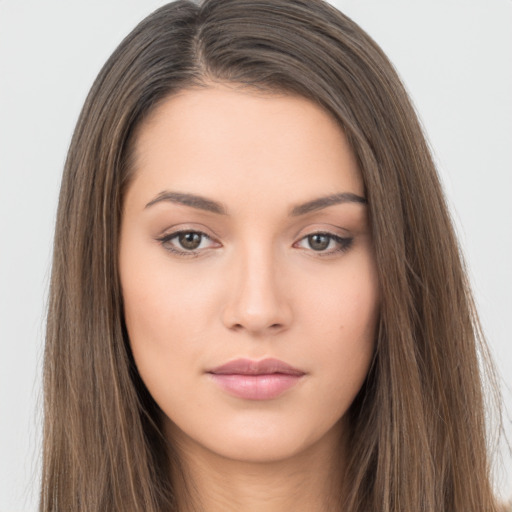 Neutral white young-adult female with long  brown hair and brown eyes