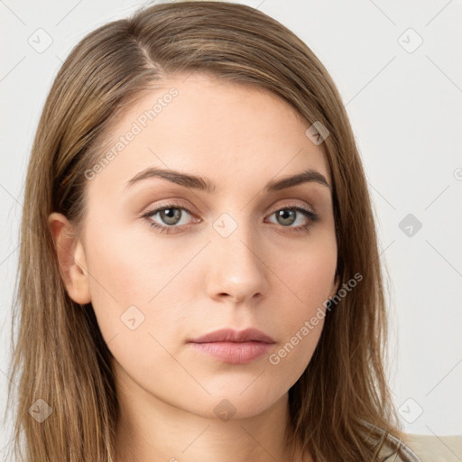 Neutral white young-adult female with long  brown hair and brown eyes