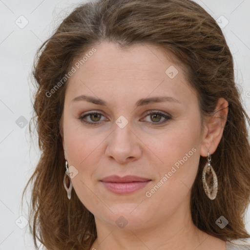 Joyful white young-adult female with long  brown hair and green eyes