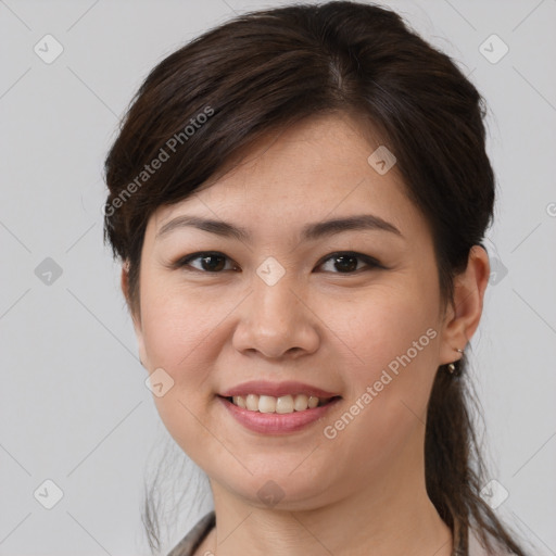 Joyful white young-adult female with medium  brown hair and brown eyes