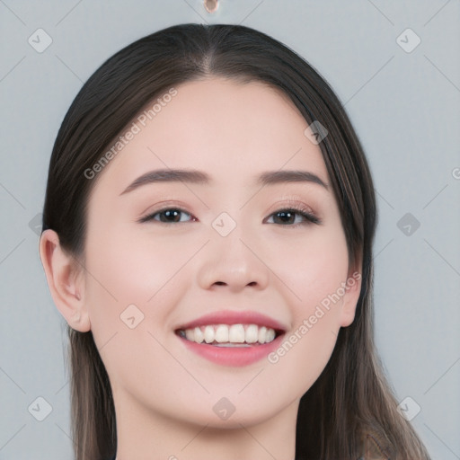 Joyful white young-adult female with long  black hair and brown eyes