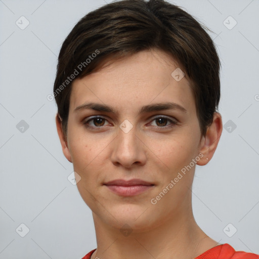 Joyful white young-adult female with short  brown hair and grey eyes