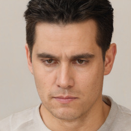 Neutral white adult male with short  brown hair and brown eyes