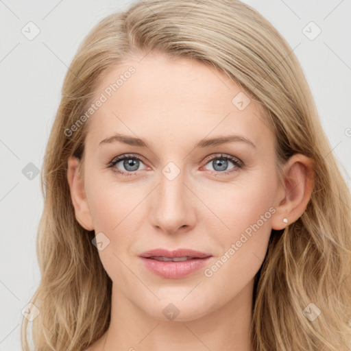 Joyful white young-adult female with long  brown hair and blue eyes