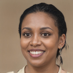 Joyful latino young-adult female with short  brown hair and brown eyes