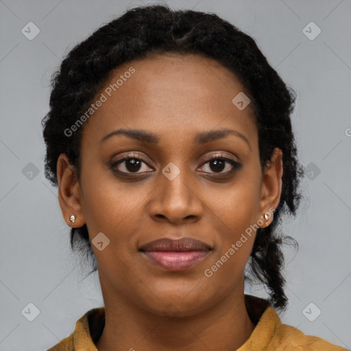 Joyful black young-adult female with long  brown hair and brown eyes