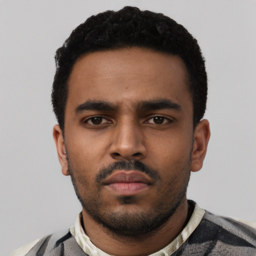 Neutral black young-adult male with short  black hair and brown eyes