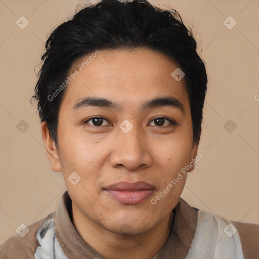 Joyful latino young-adult male with short  black hair and brown eyes