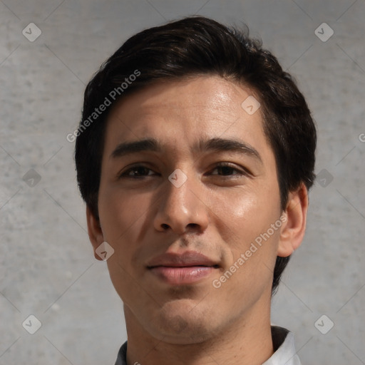 Joyful white young-adult male with short  black hair and brown eyes