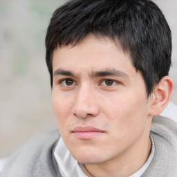 Neutral white young-adult male with short  black hair and brown eyes