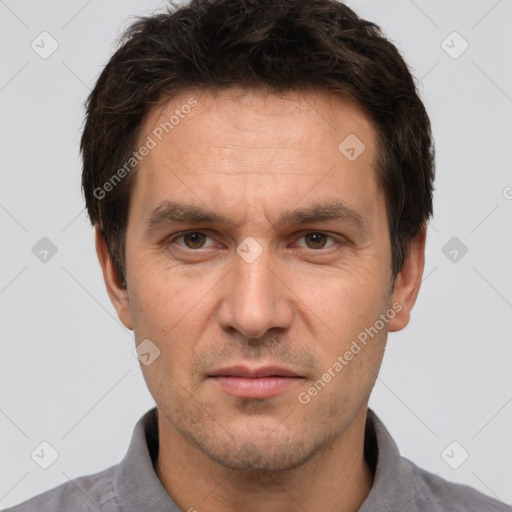 Neutral white adult male with short  brown hair and brown eyes